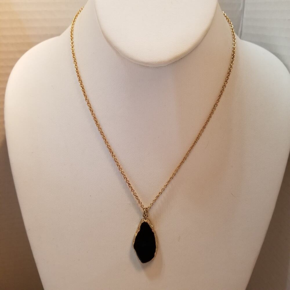 Plunder style gold tone faux black onyx looking 18" necklace with a four in. ex.